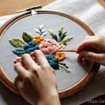 Home 22 기술 피로 회복을 위한 취미 찾기 - **A Serene Moment of Hand Embroidery:** "A close-up shot of a person's hands delicately working ...