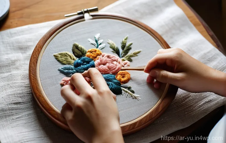 기술 피로 회복을 위한 취미 찾기 - **A Serene Moment of Hand Embroidery:** "A close-up shot of a person's hands delicately working ...